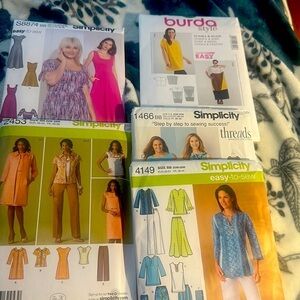 5 pattern sewing set. 5 New Simplicity sz 20w and 28w. 1 Burda sz 18-34